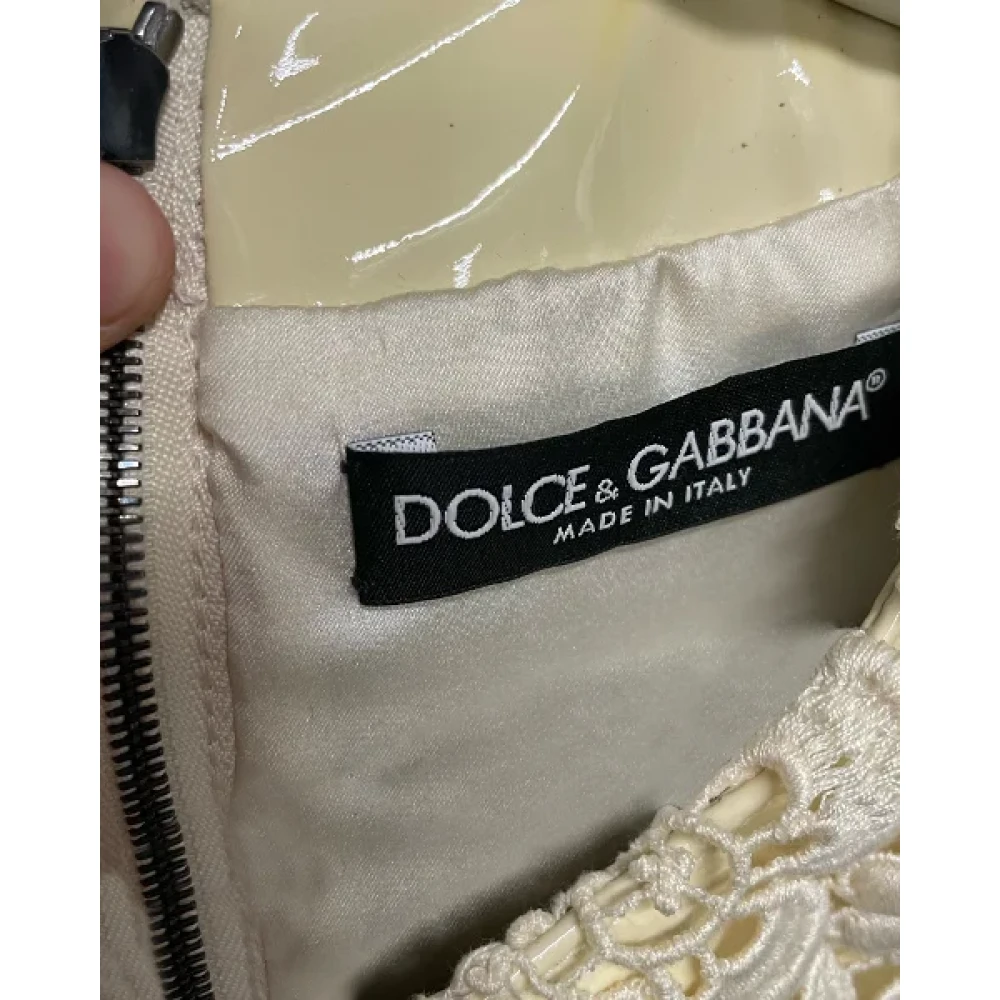 Dolce & Gabbana Pre-owned Leather dresses Beige Dames