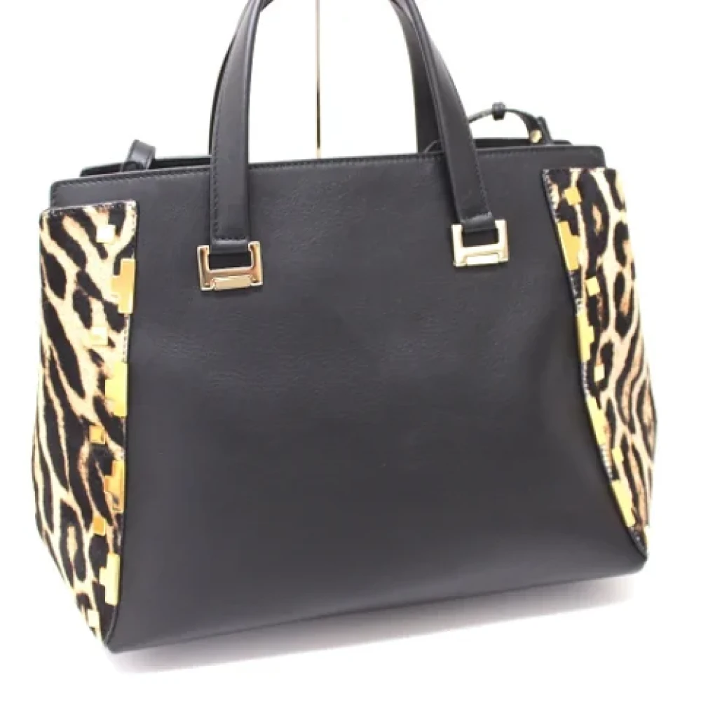 Jimmy Choo Pre-owned Leather handbags Brown Dames