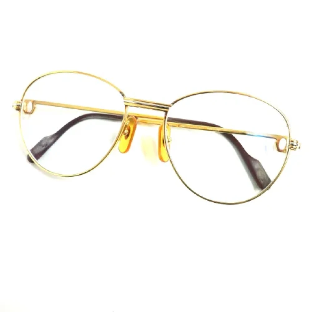 Cartier Vintage Pre-owned Metal sunglasses Yellow Dames