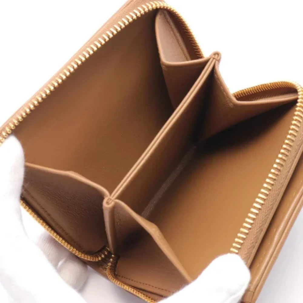 Miu Pre-owned Leather wallets Brown Dames