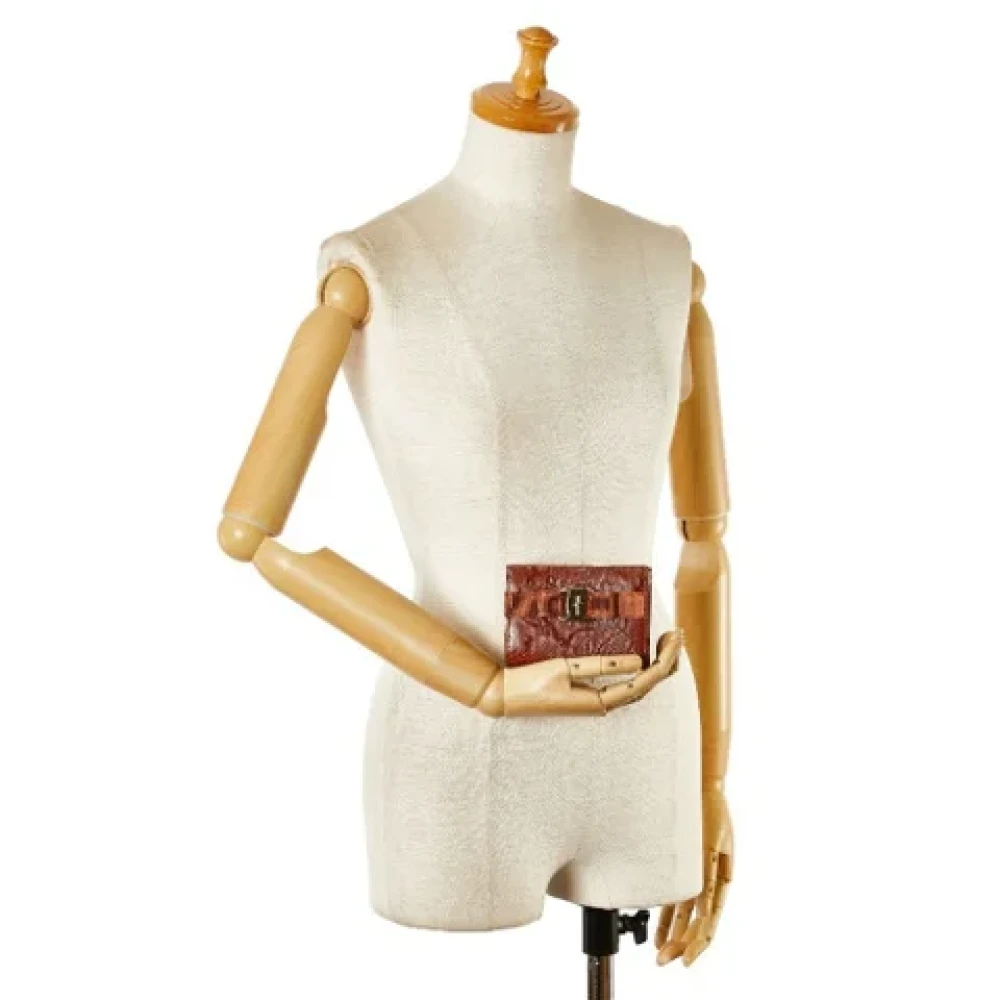 Salvatore Ferragamo Pre-owned Leather clutches Brown Dames