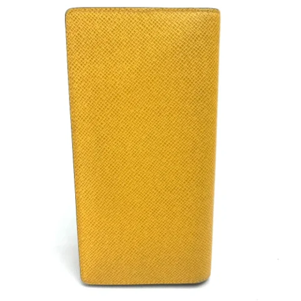 Louis Vuitton Vintage Pre-owned Leather wallets Yellow Heren