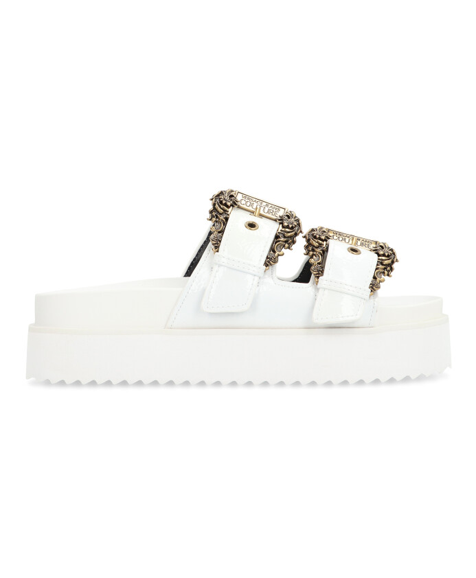 mules-en-caoutchouc-avec-boucles-et-plateforme