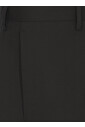 black-wool-suit-with-iconic-pin
