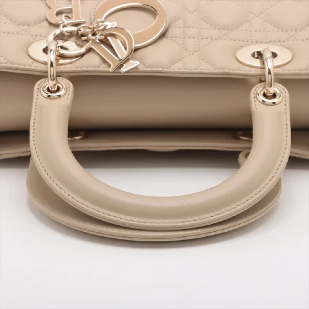 Dior Vintage Pre-owned Leather handbags Beige Dames