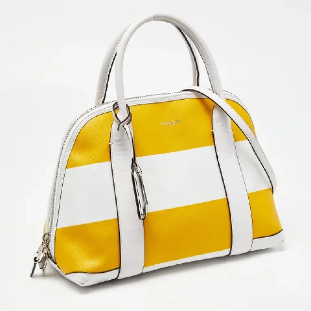 Coach Pre-owned Coated canvas handbags Yellow Dames