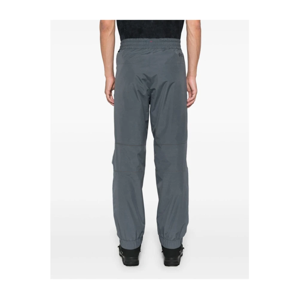 Moncler Grijze gewatteerde broek met reflecterende details Gray Heren