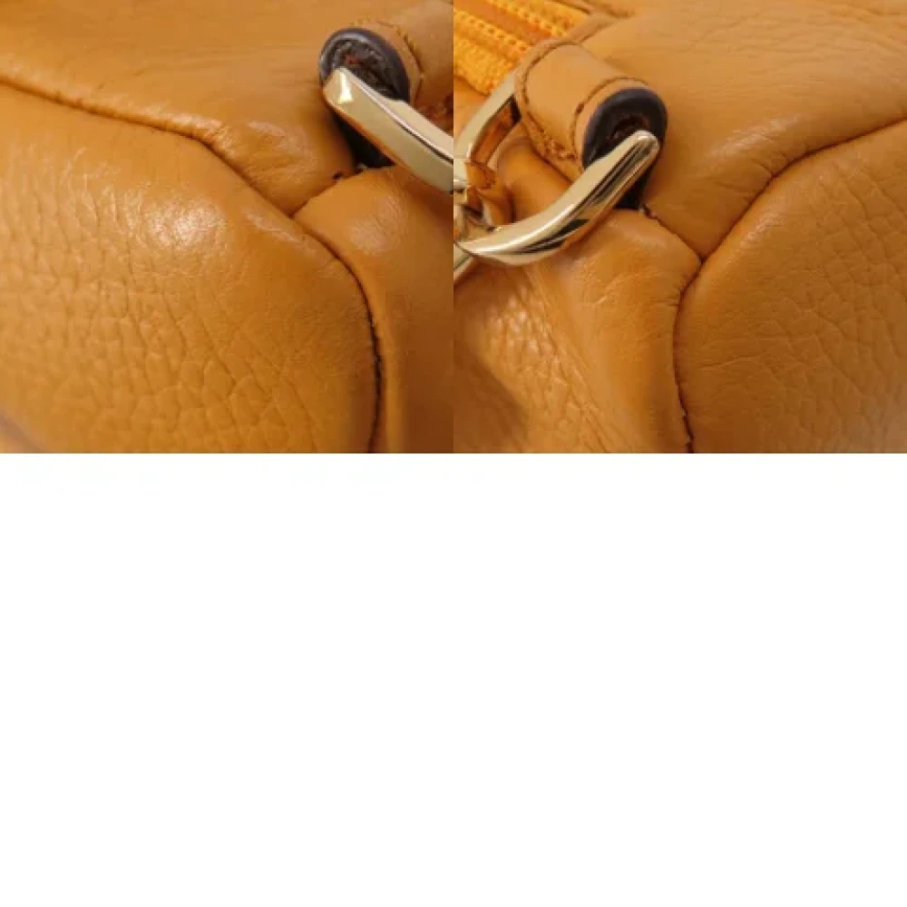 Michael Kors Pre-owned Fabric backpacks Yellow Dames