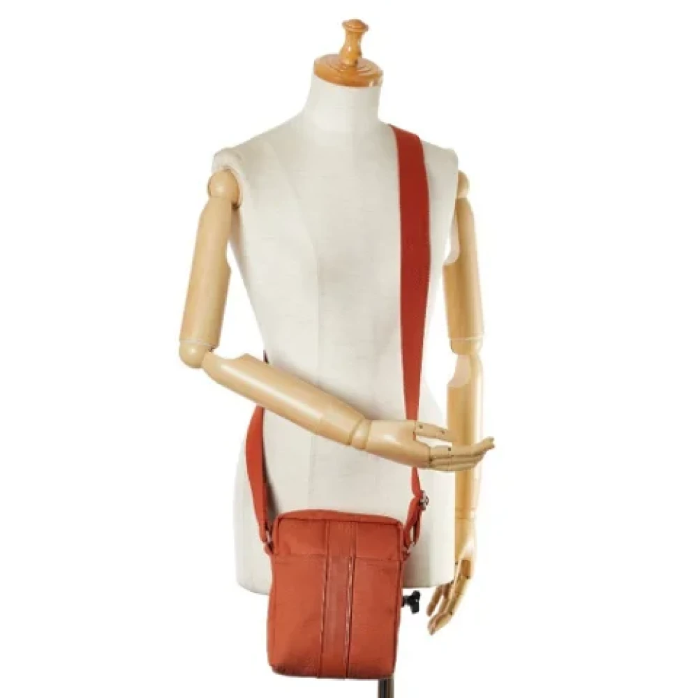 Hermès Vintage Pre-owned Canvas shoulder-bags Orange Dames