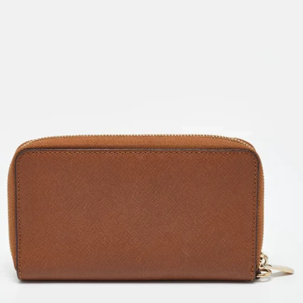 Michael Kors Pre-owned Leather wallets Brown Dames
