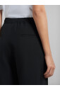 tropical-wool-trousers-with-mending