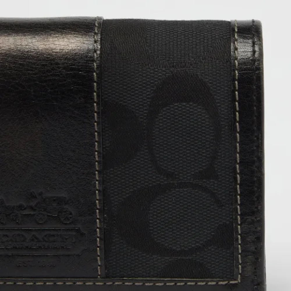 Coach Pre-owned Canvas wallets Black Dames