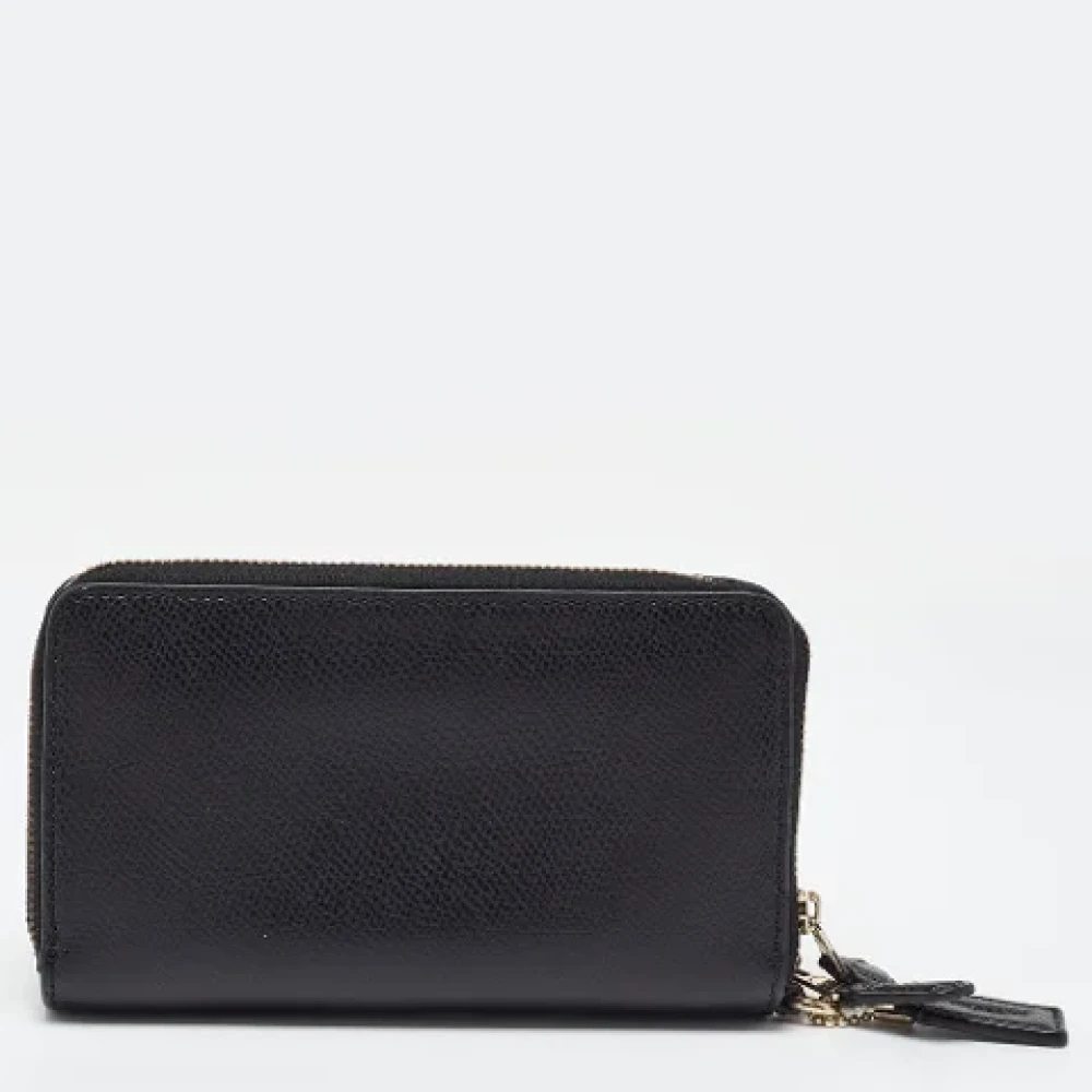 Coach Pre-owned Leather wallets Black Dames