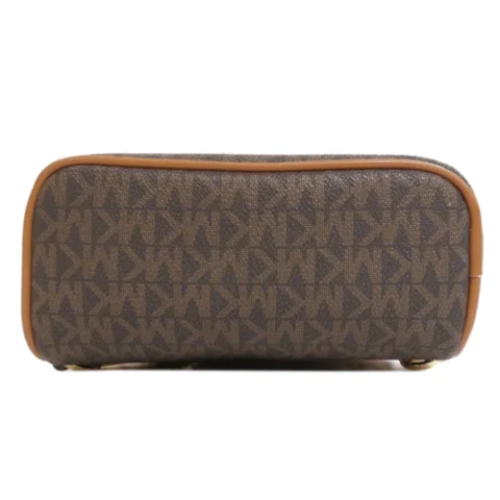 Michael Kors Pre-owned Plastic backpacks Brown Dames