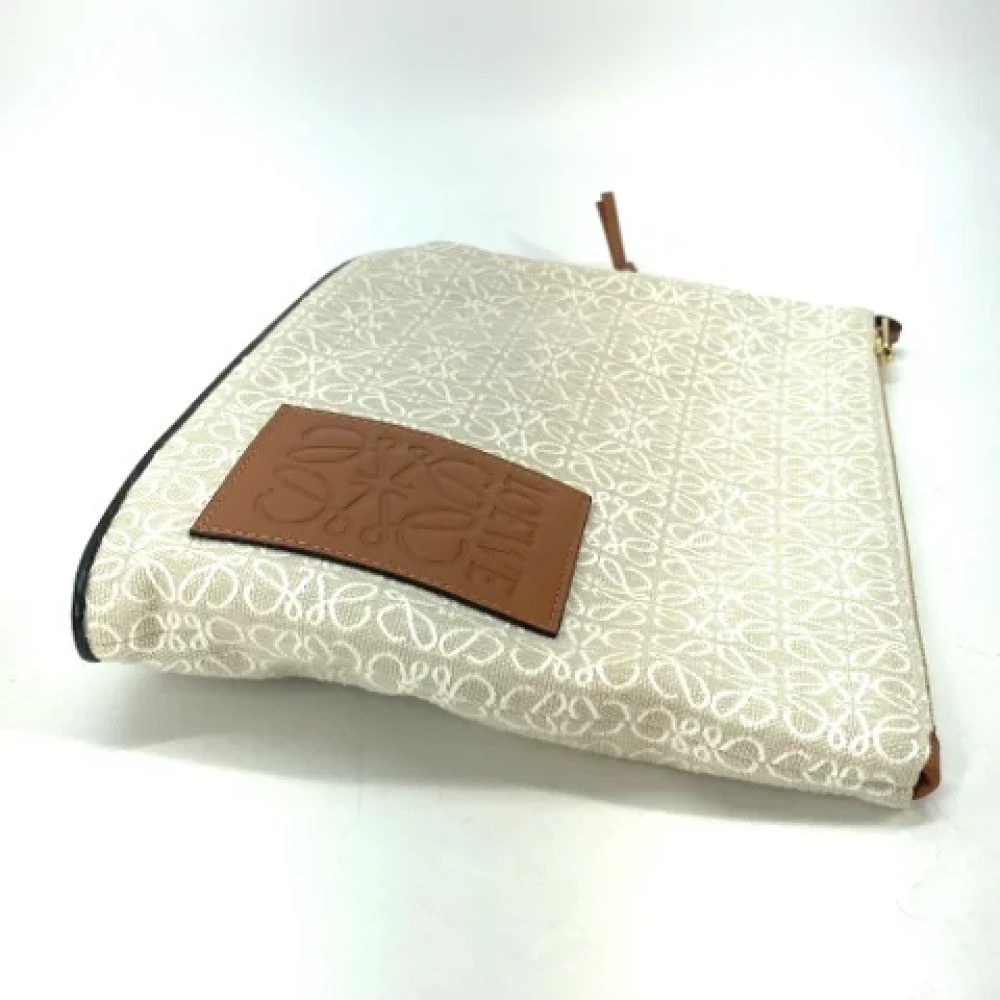 Loewe Pre-owned Fabric clutches Beige Heren
