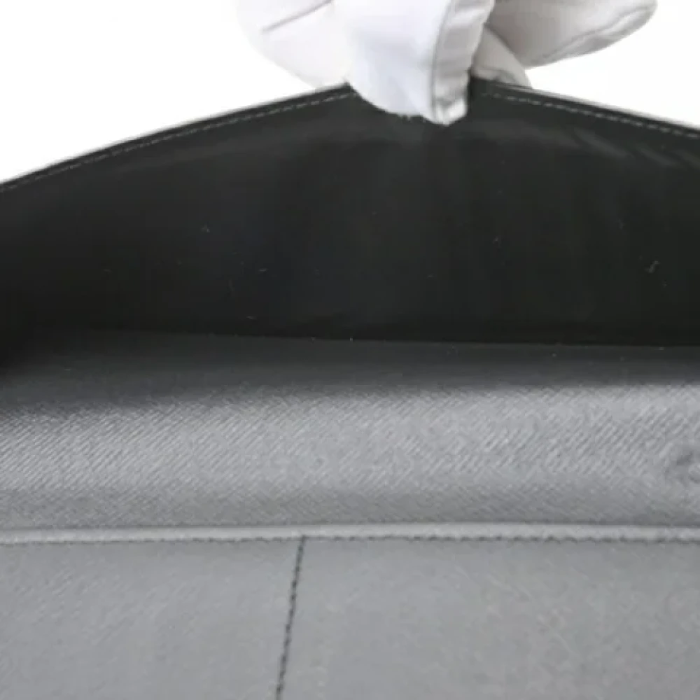 Louis Vuitton Vintage Pre-owned Leather wallets Black Heren