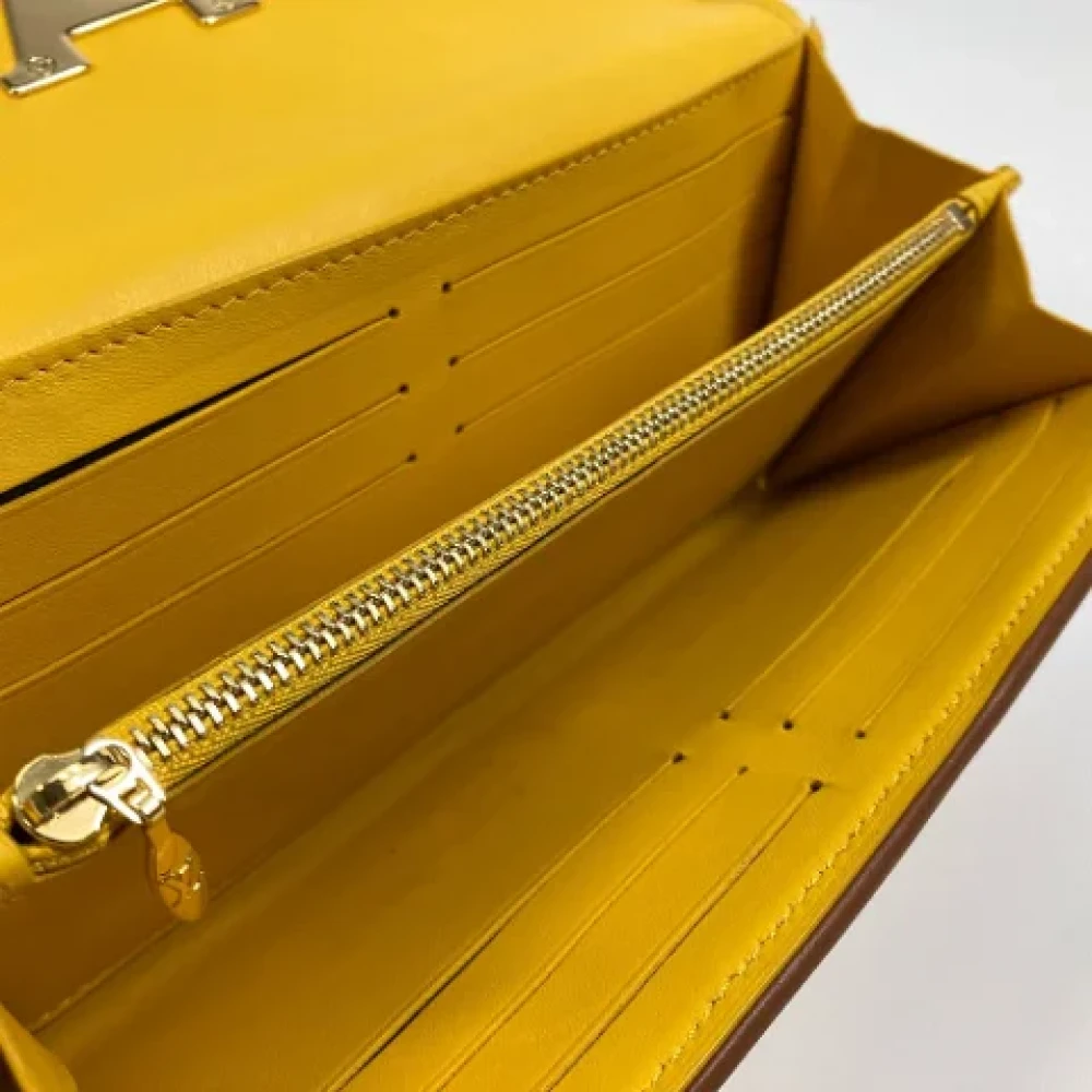 Louis Vuitton Vintage Pre-owned Canvas wallets Yellow Dames
