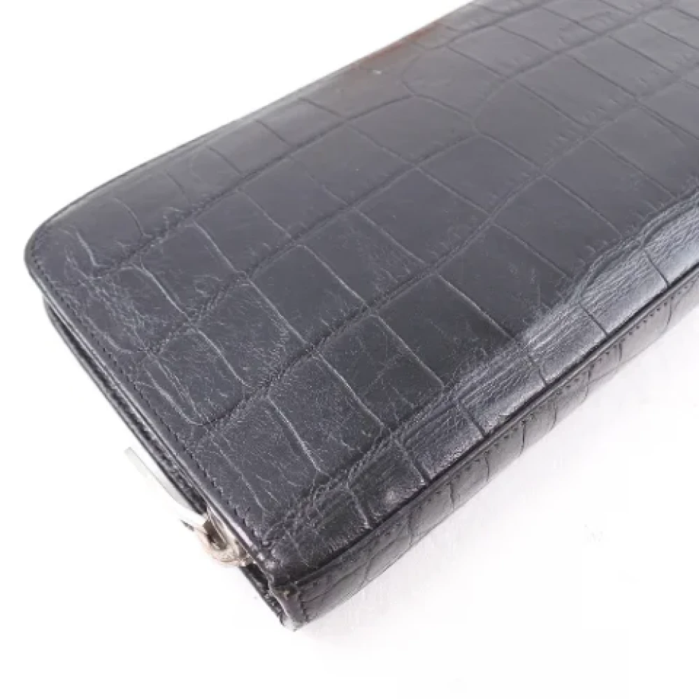 Yves Saint Laurent Vintage Pre-owned Leather wallets Black Heren