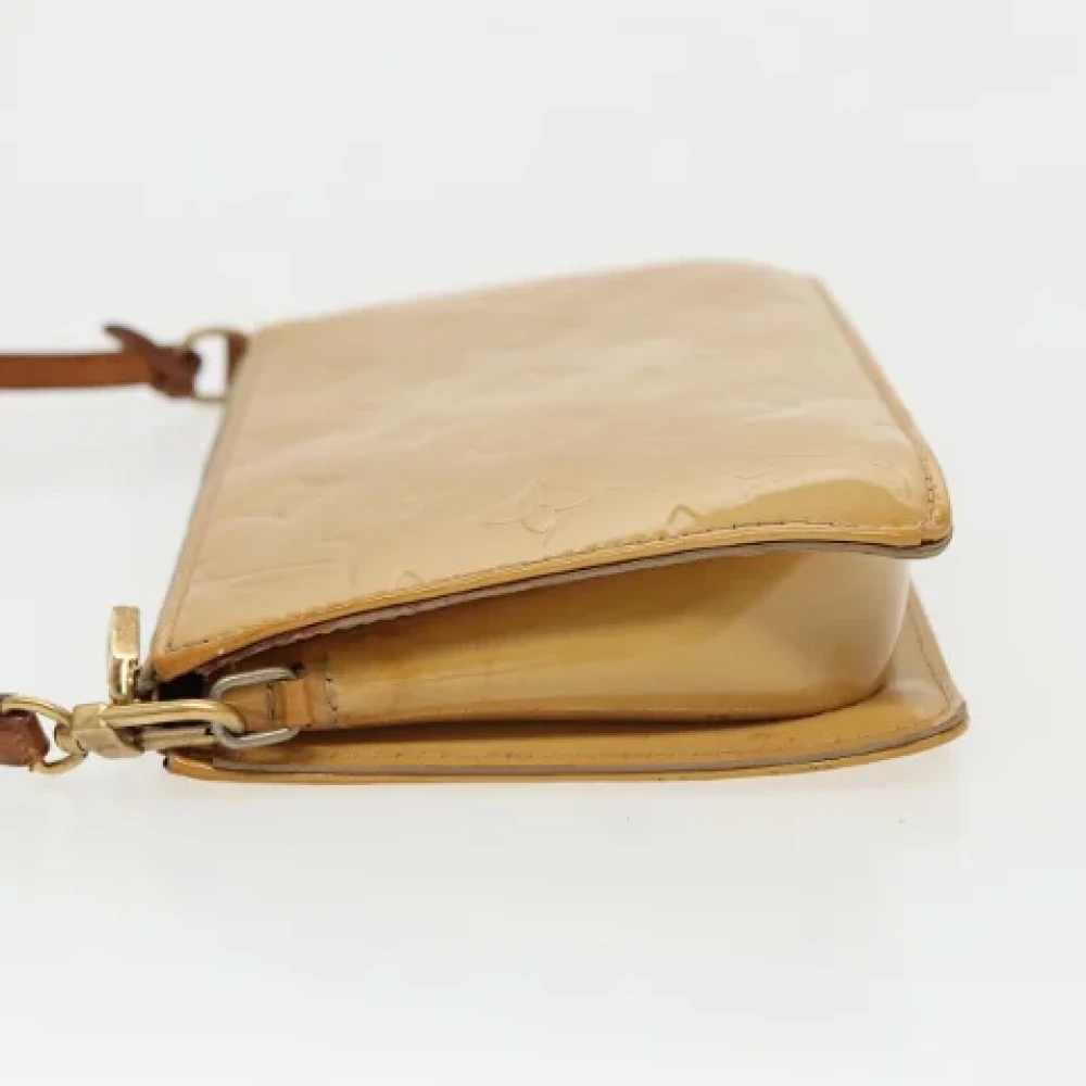 Louis Vuitton Vintage Pre-owned Leather pouches Beige Dames