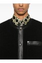 veste-minimaliste-en-tweed-boucle-avec-finitions-en-cuir