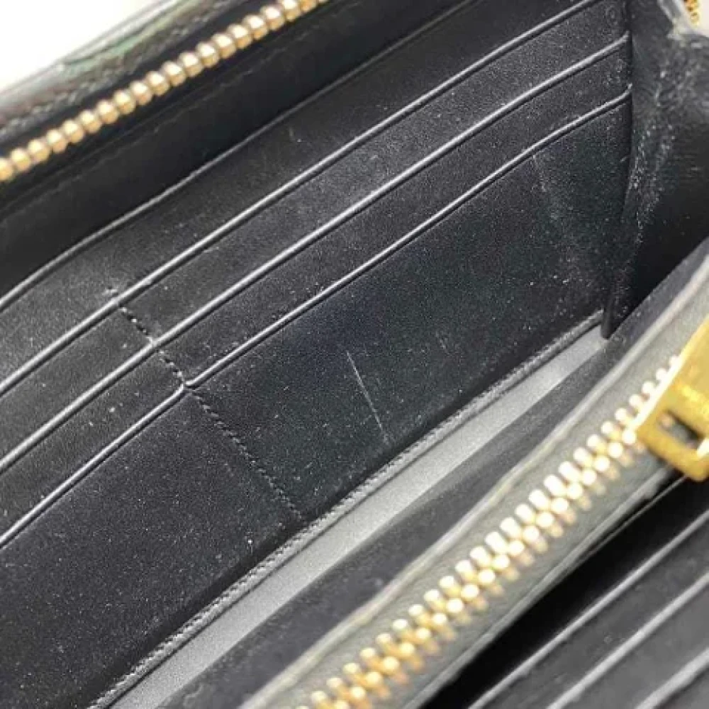 Yves Saint Laurent Vintage Pre-owned Leather wallets Black Dames