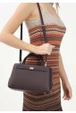 bruine-handtas-elegant-en-verfijnd