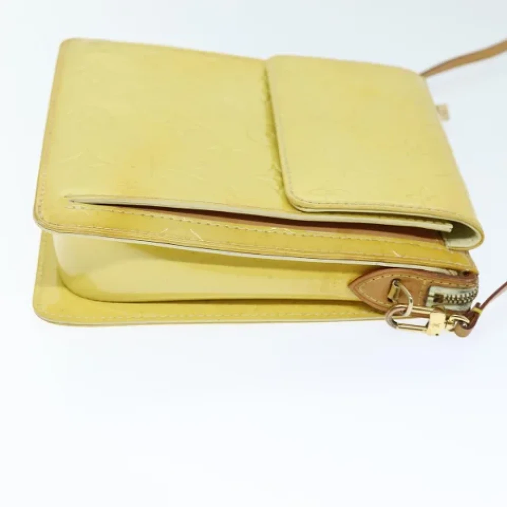Louis Vuitton Vintage Pre-owned Leather clutches Yellow Dames