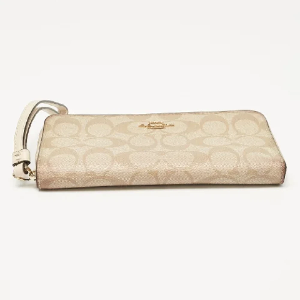 Coach Pre-owned Coated canvas wallets Beige Dames