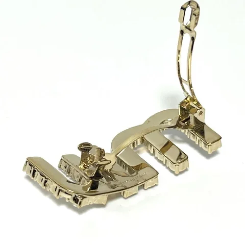 Miu Pre-owned Metal hair-accessories Yellow Dames