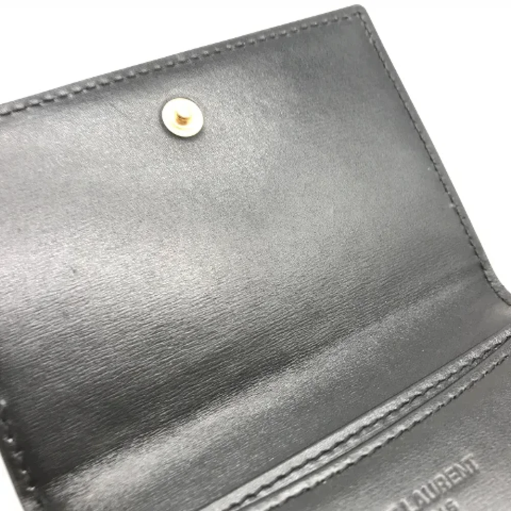 Yves Saint Laurent Vintage Pre-owned Leather wallets Black Dames