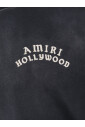 t-shirts-et-polos-noirs-avec-col-rond-cotele-manches-courtes-logo-oversize-imprime