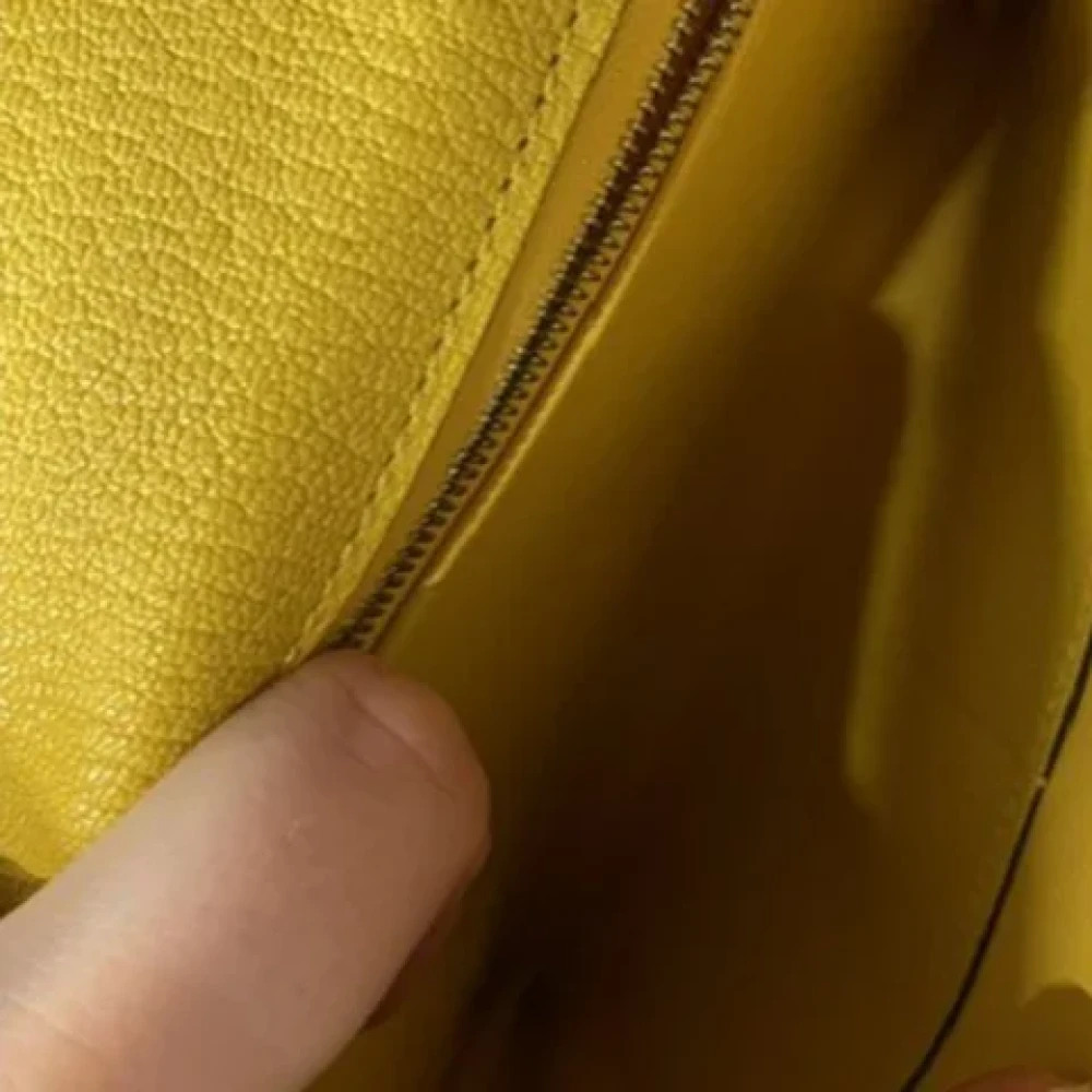 Hermès Vintage Pre-owned Leather clutches Yellow Dames