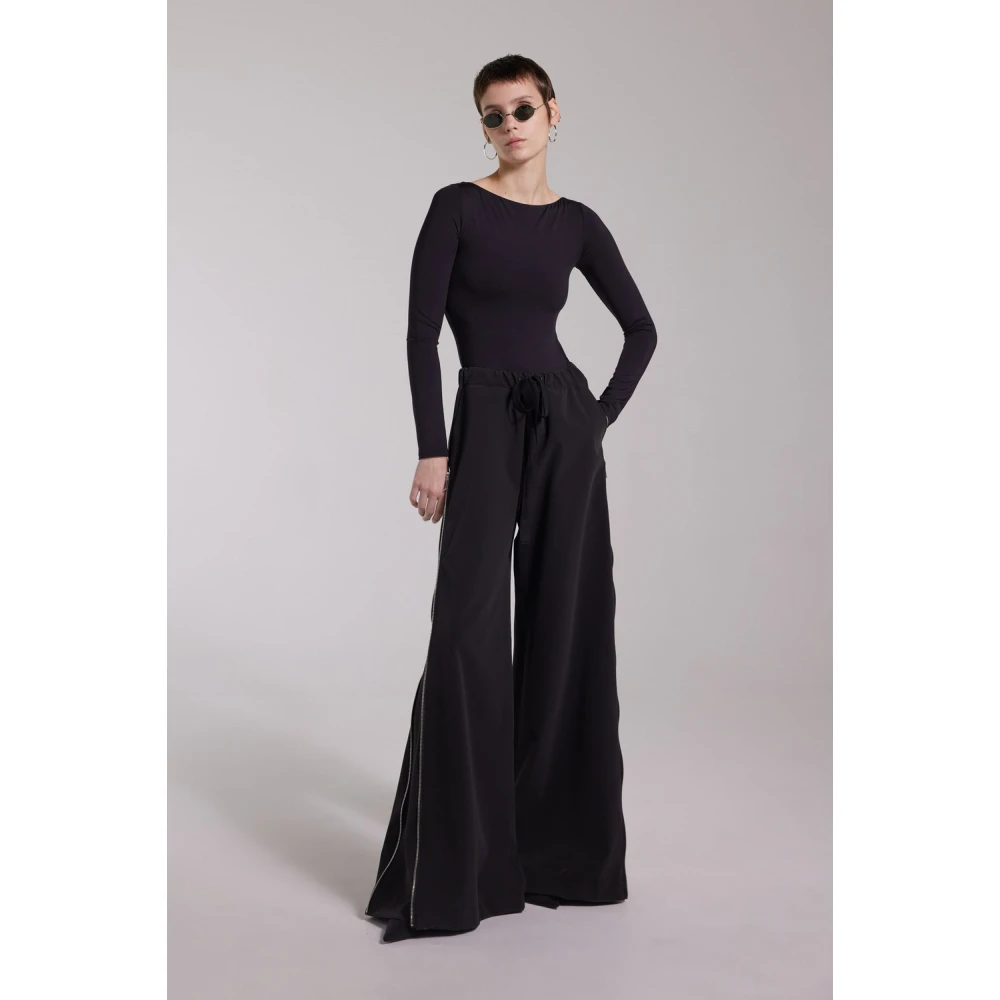 Stutterheim Regenbroek met dramatische silhouet Black Dames