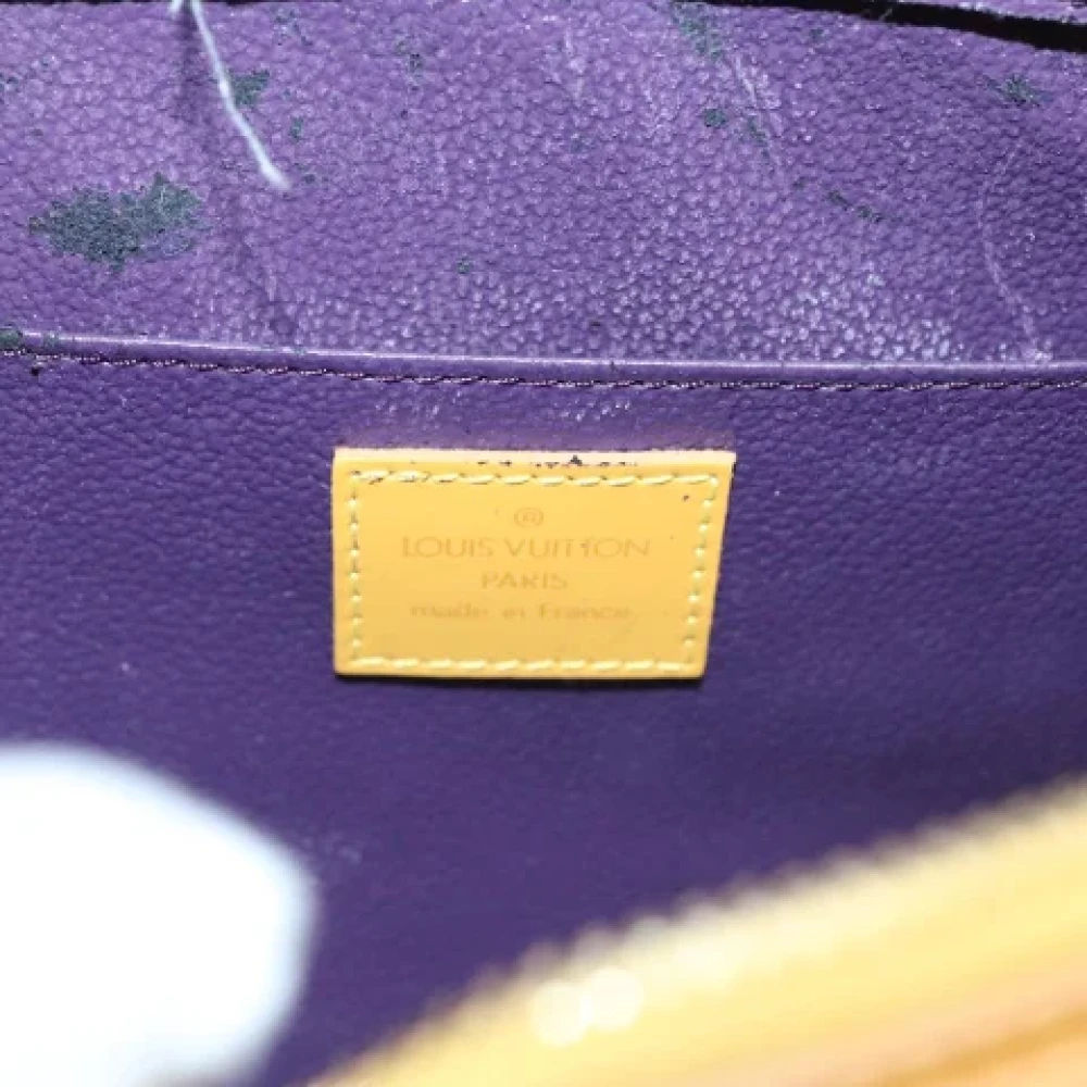Louis Vuitton Vintage Pre-owned Leather pouches Yellow Dames