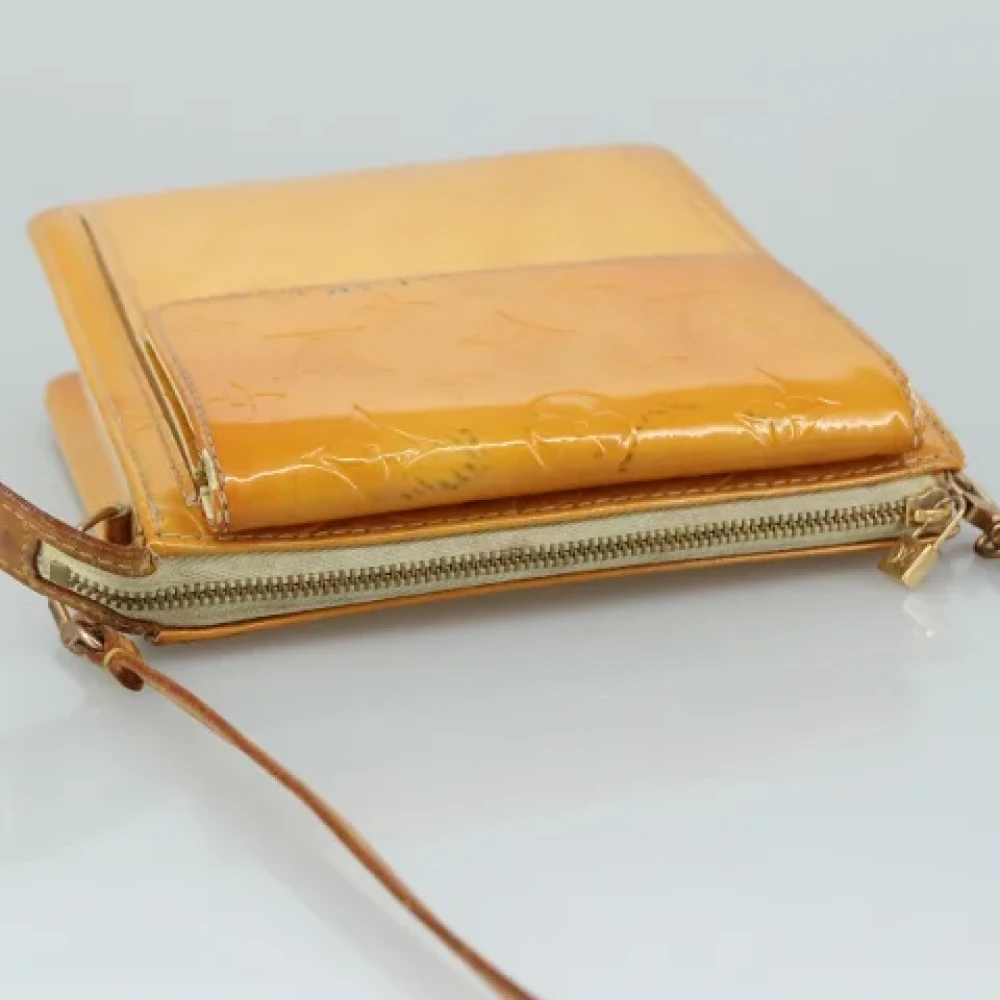 Louis Vuitton Vintage Pre-owned Leather pouches Yellow Dames
