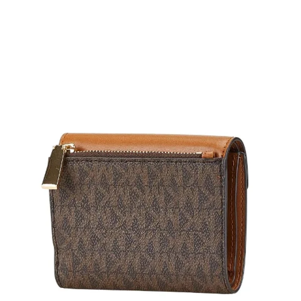 Michael Kors Pre-owned Canvas wallets Brown Dames