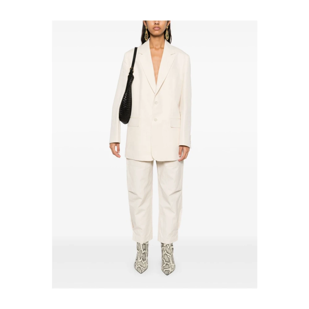 Filippa K Roomkleurige jas met knoopsluiting Zakken Beige Dames