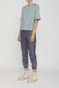 teal-o-neck-top-avec-epaulettes-rembourrees