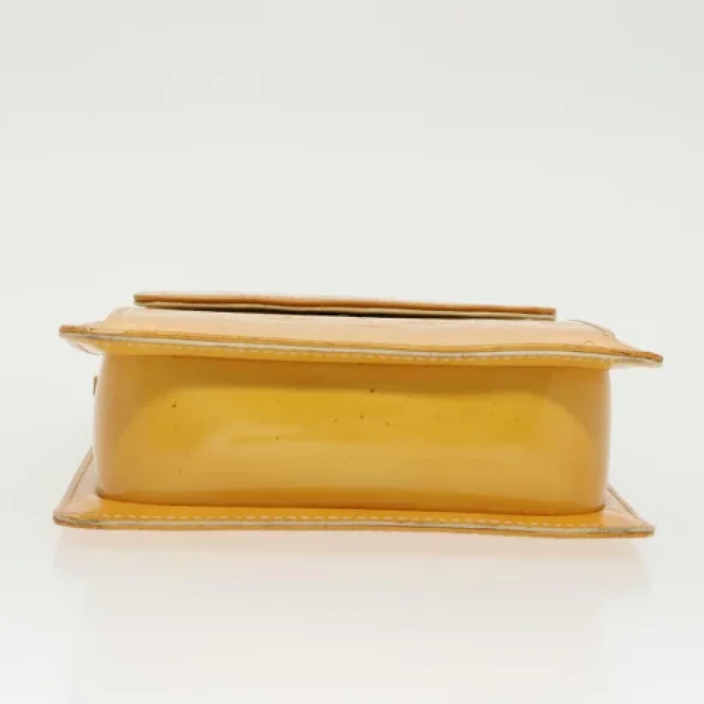 Louis Vuitton Vintage Pre-owned Leather clutches Yellow Dames
