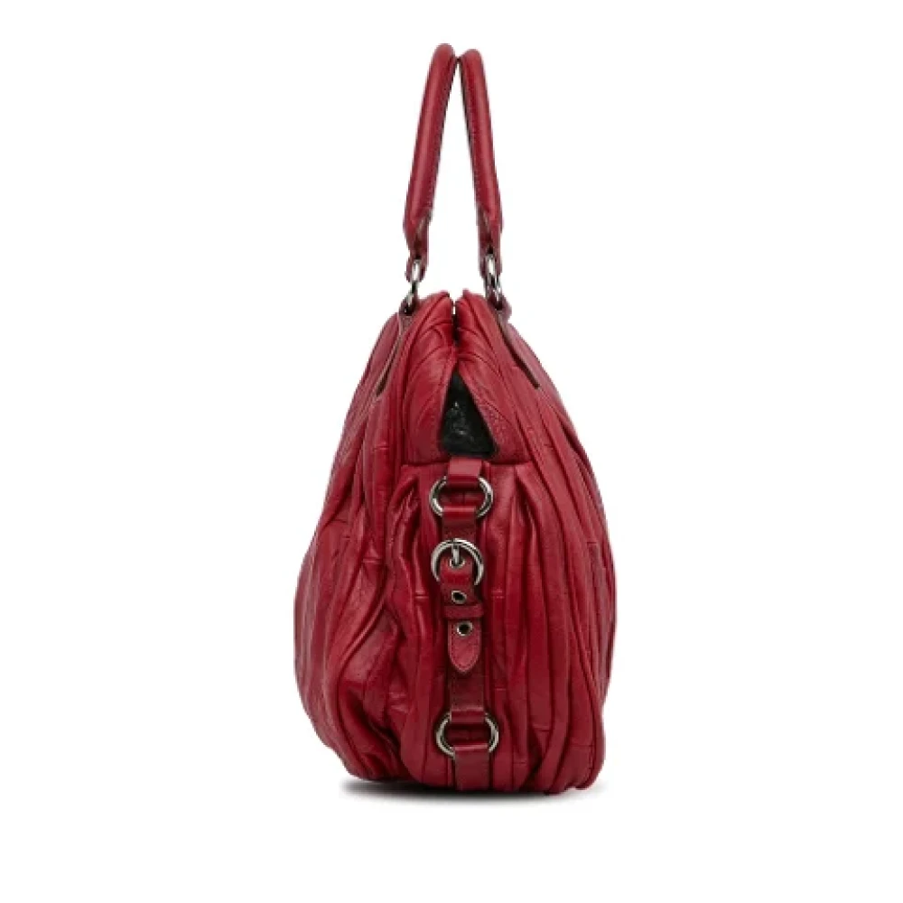 Miu Pre-owned Leather totes Red Dames