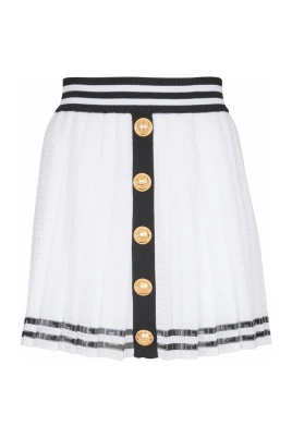 Plisserad kjol med monogramstickning
