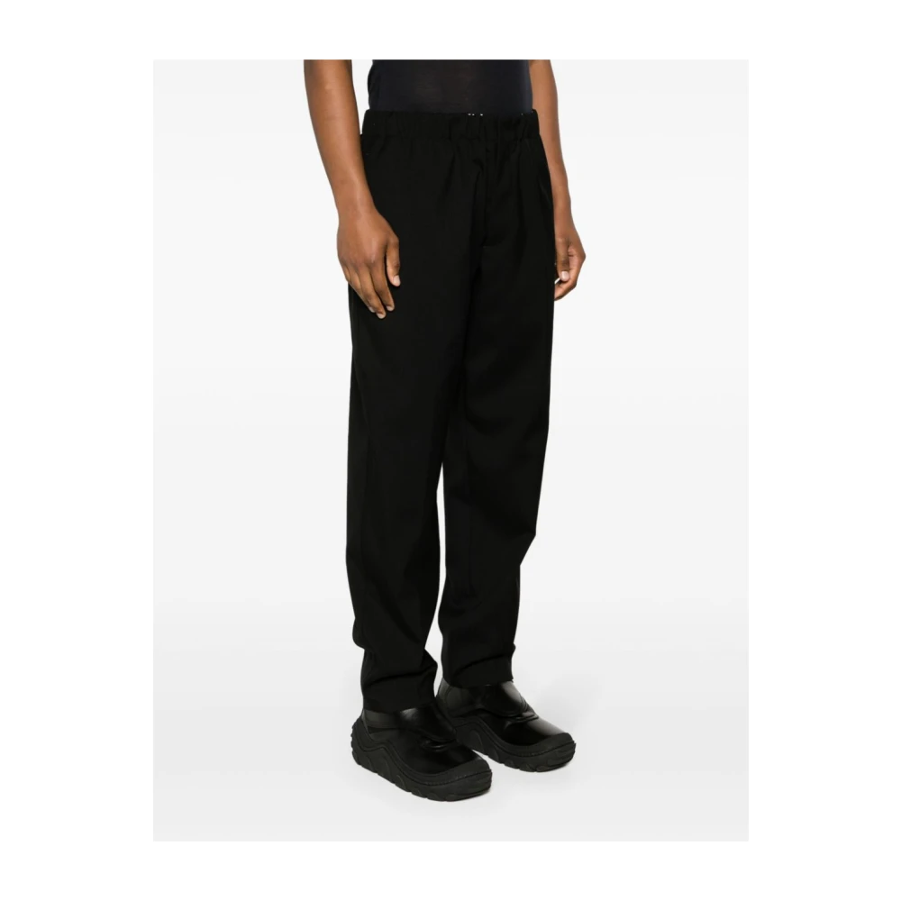 Jil Sander Zwarte broek met elastische taille en plooien Black Heren