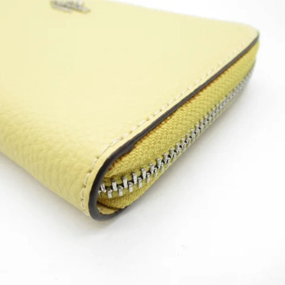 Coach Pre-owned Leather wallets Yellow Dames