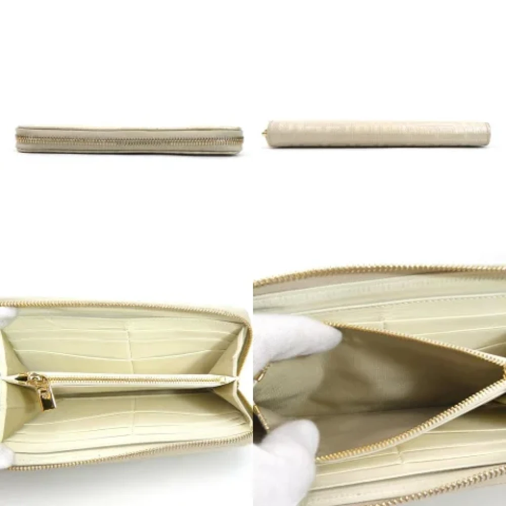 Givenchy Pre-owned Canvas wallets Beige Dames