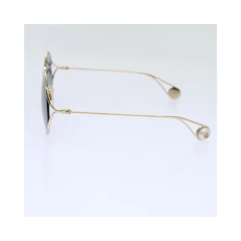 Gucci Vintage Pre-owned Metal sunglasses Yellow Dames