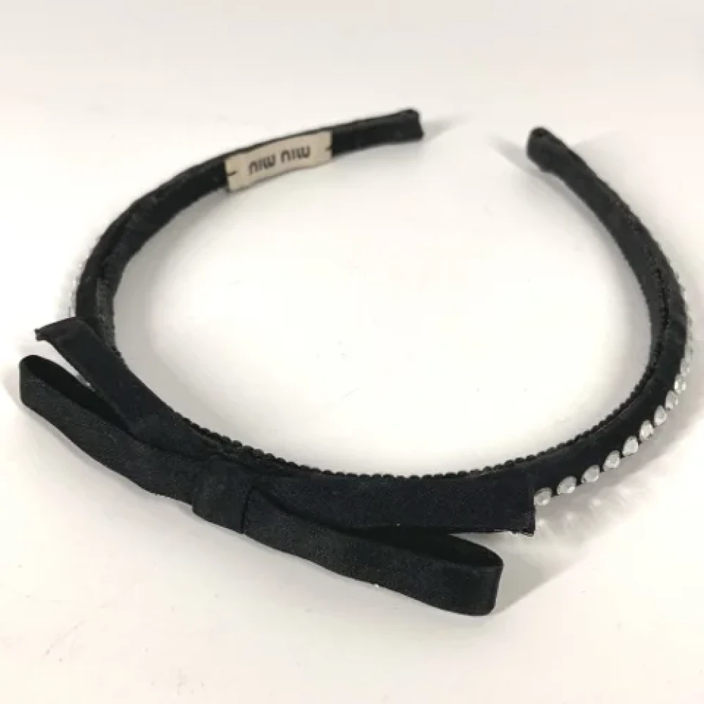 Miu Pre-owned Fabric hair-accessories Black Dames