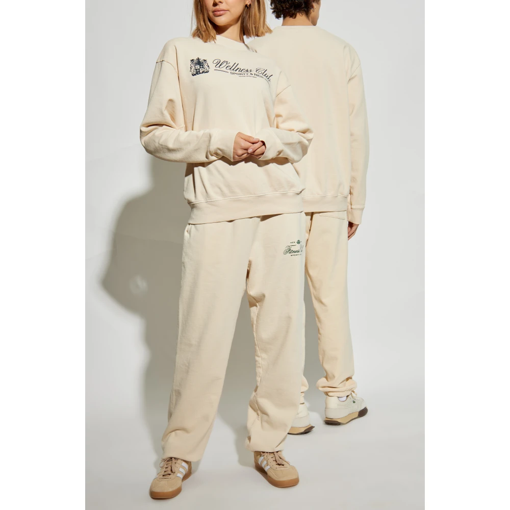 Sporty & Rich Sweatshirt uit de Wellness Club collectie Beige Unisex