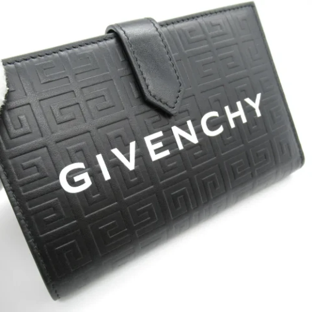 Givenchy Pre-owned Leather wallets Black Unisex
