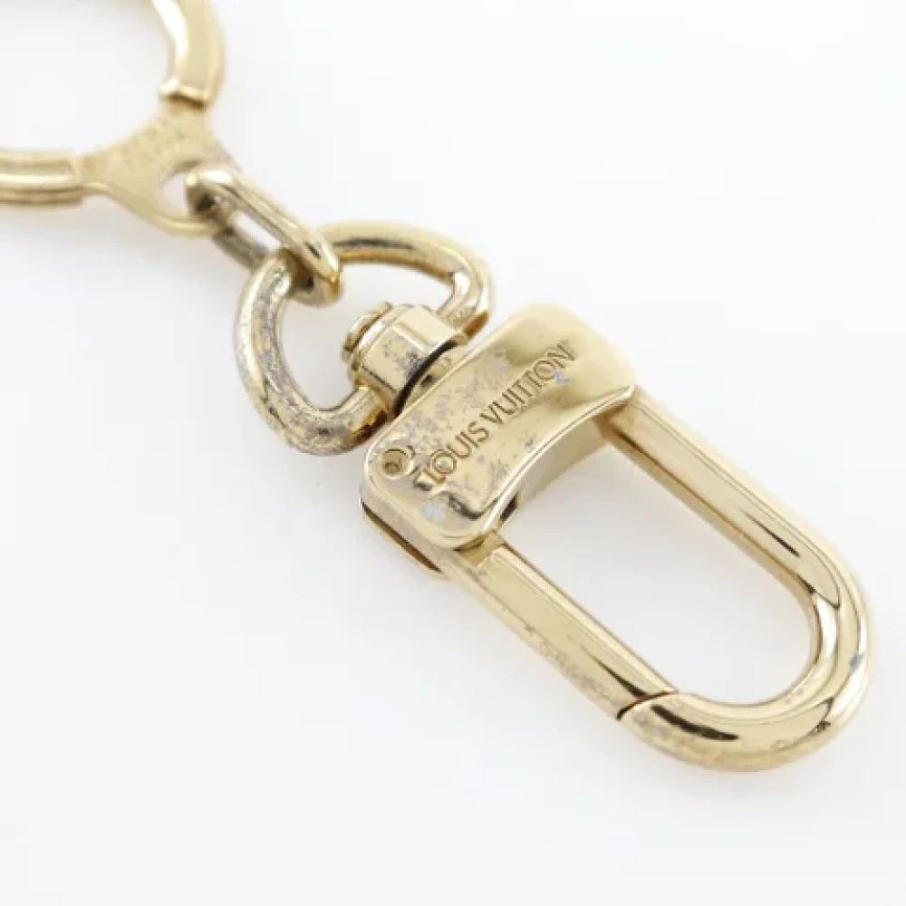 Louis Vuitton Vintage Pre-owned Metal key-holders Yellow Dames