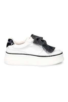 white-slip-on-sneakers-with-rhinestone-bow